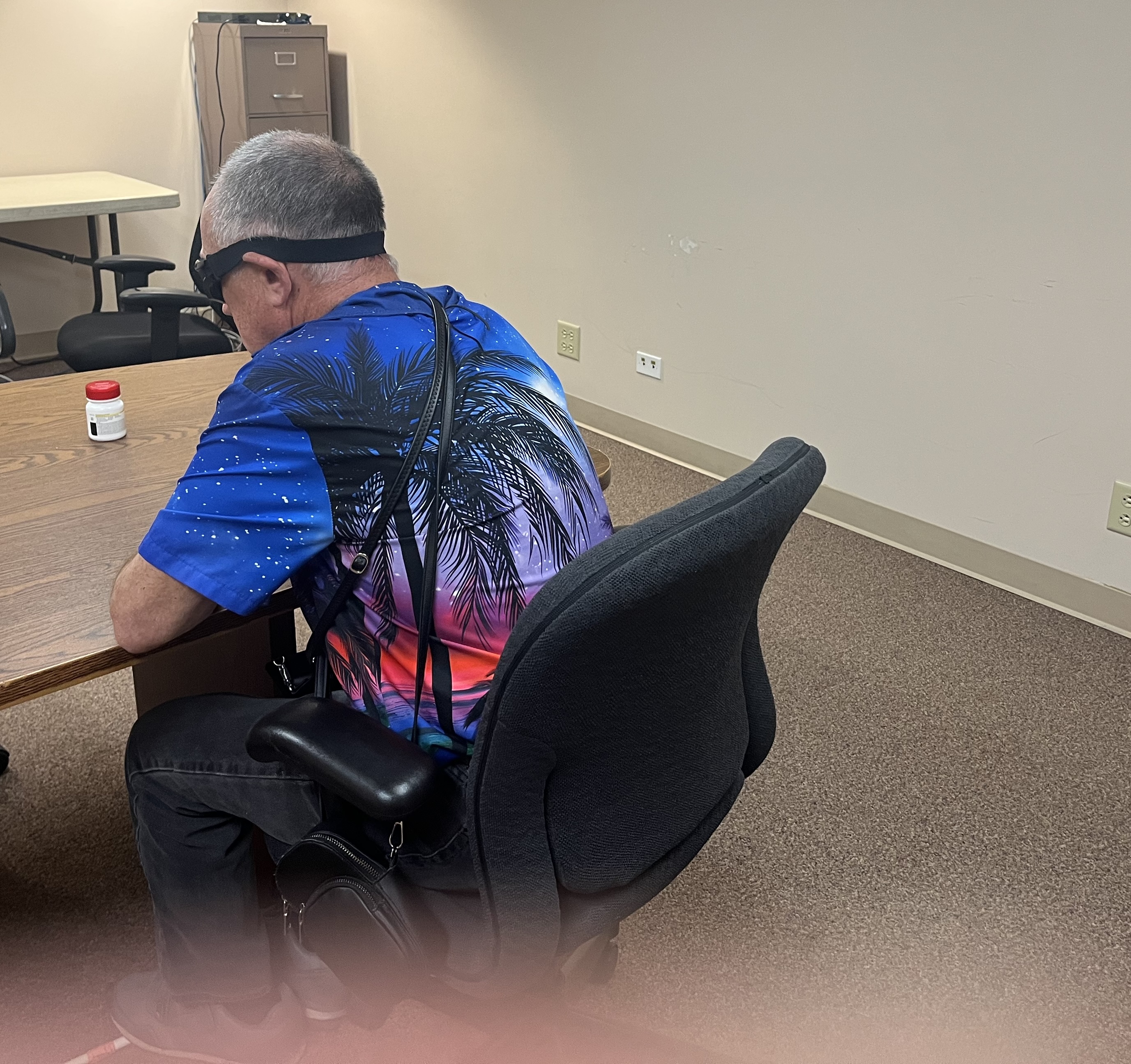 A participant using a Praxiva product during a study
